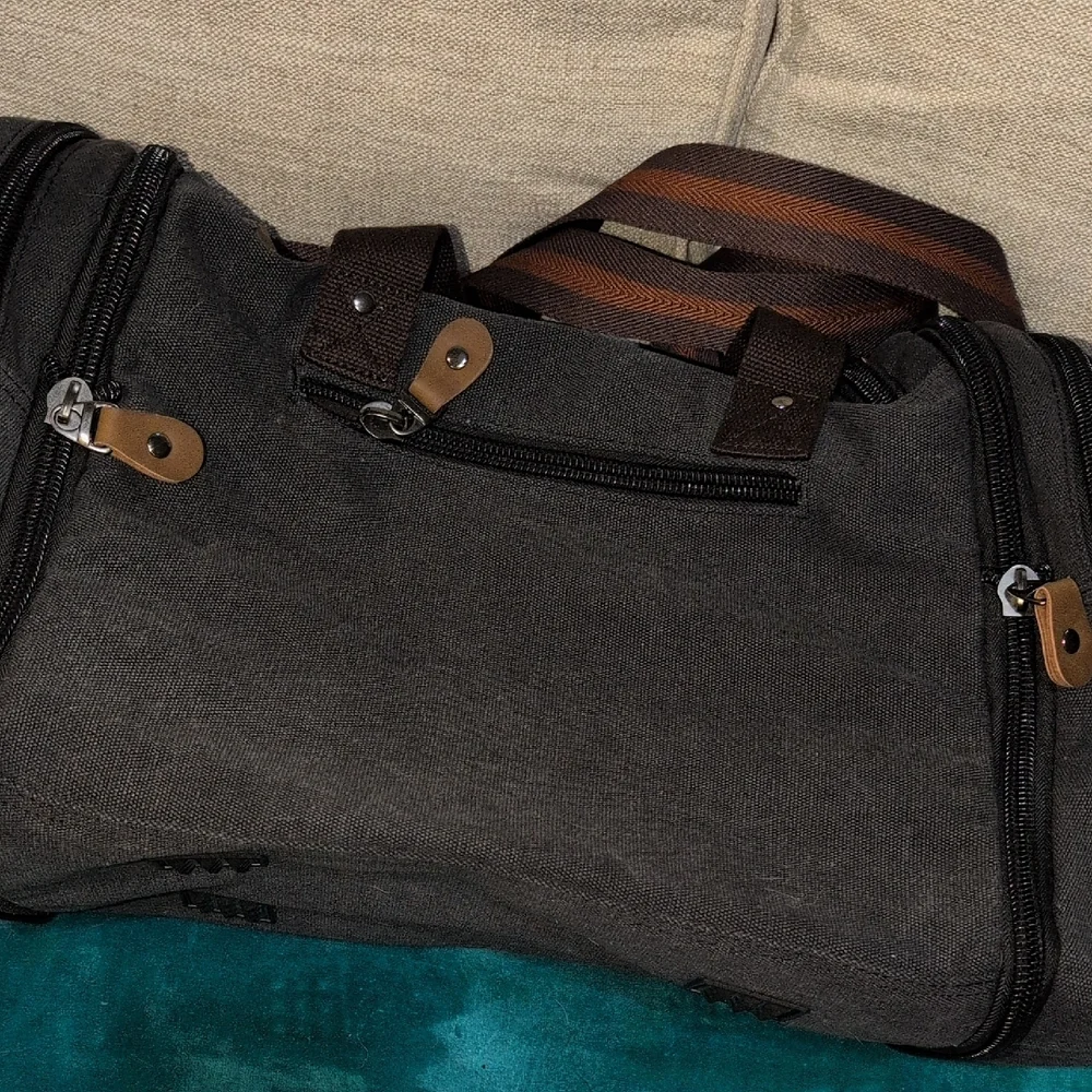 Black Expandable Canvas Duffel Bag With Shoulder Strap